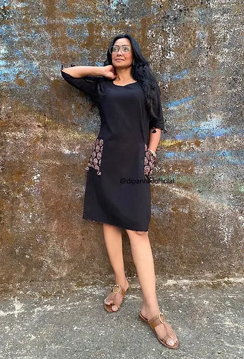 Solid black shift dress